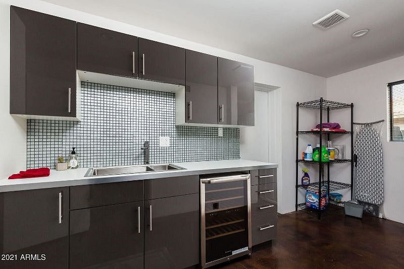 2nd Master bedroom also has a connected mini kitchen w/wine fridge & sink.