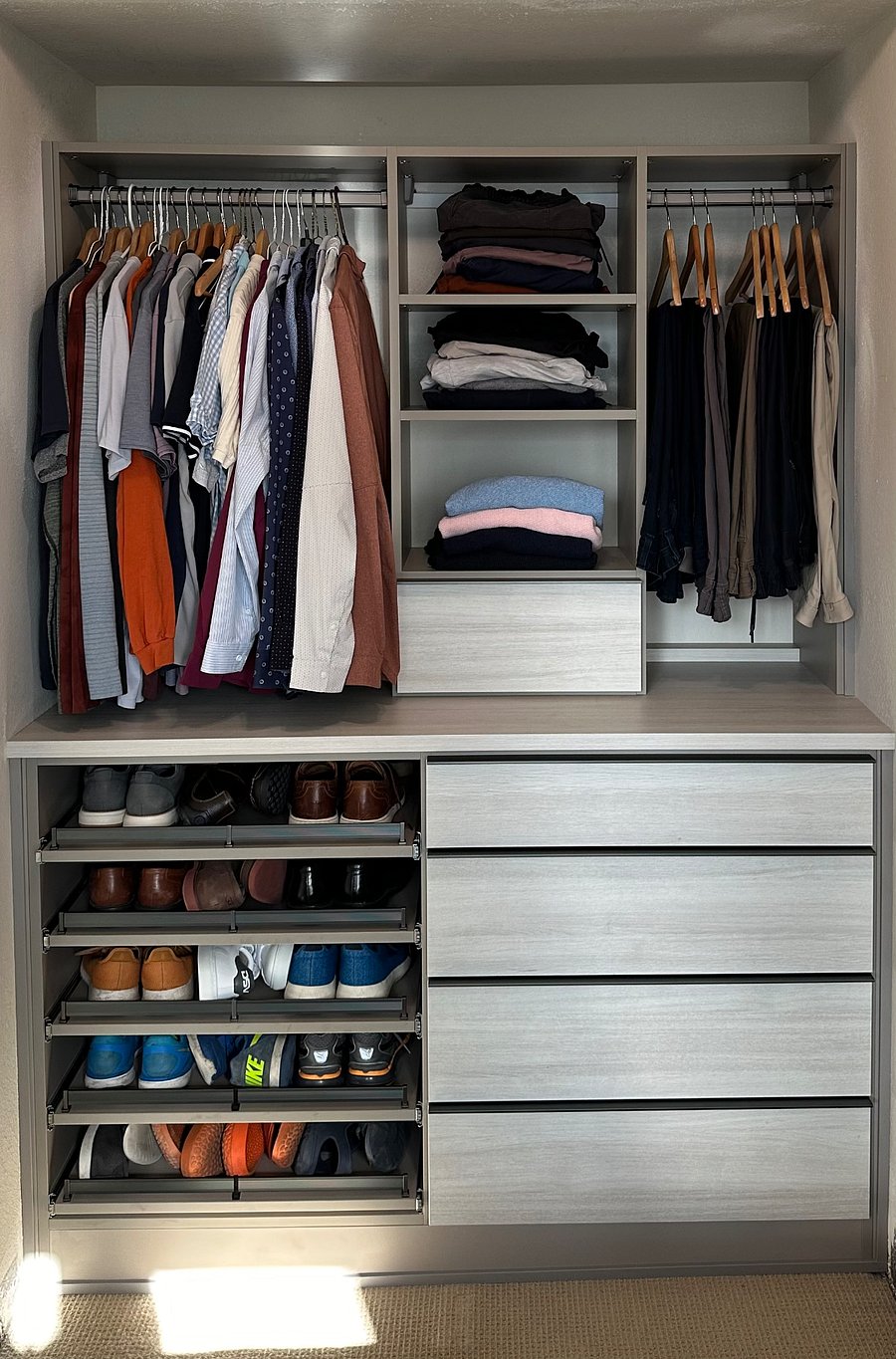 Drab old closet ripped out and replaced with California Closets wardrobe.