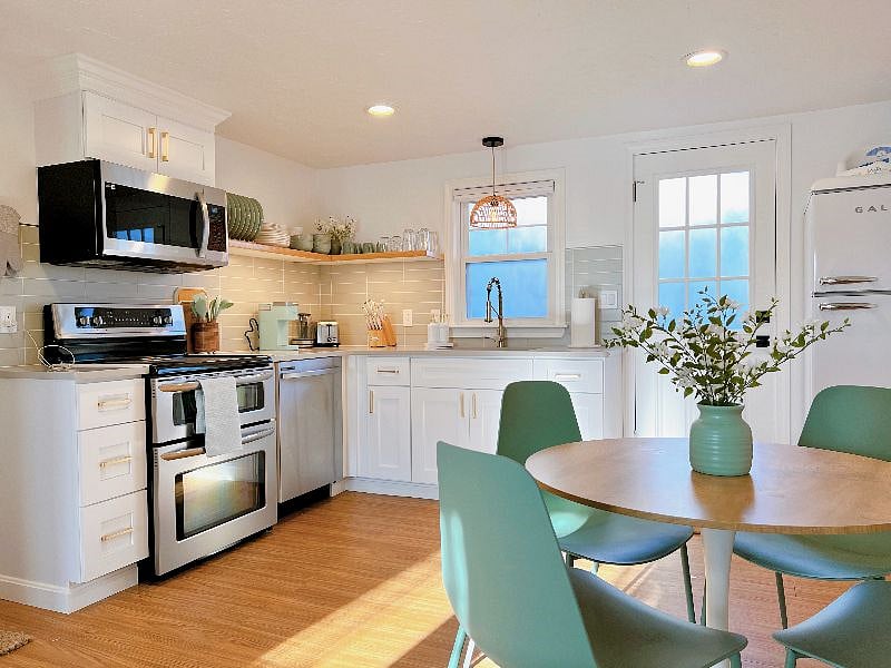 Open dining and kitchen makes the home feel spacious