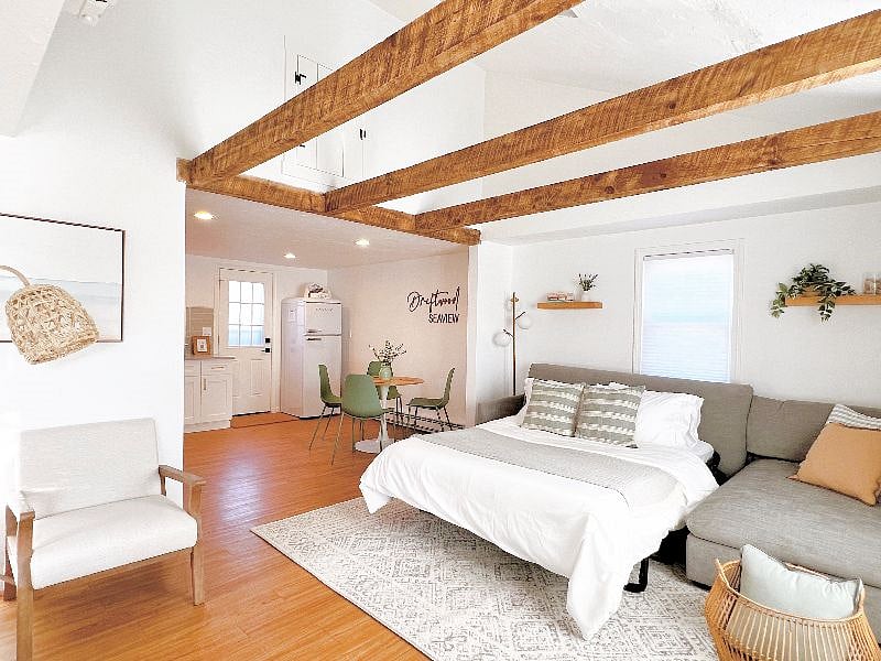Our comfortable sofa converts into a queen sized bed.