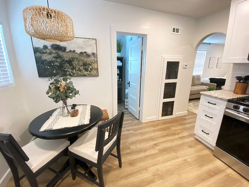 This studio home features three separate living spaces to include: (1) cozy bedroom/living area, (2) full kitchen and dining area, (3) private bathroom.