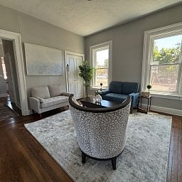Living room featuring comfortable seating and natural light.