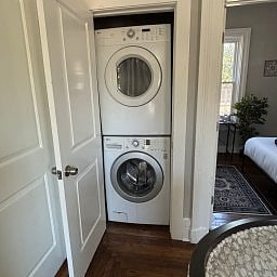 In-unit stacked washer and dryer.