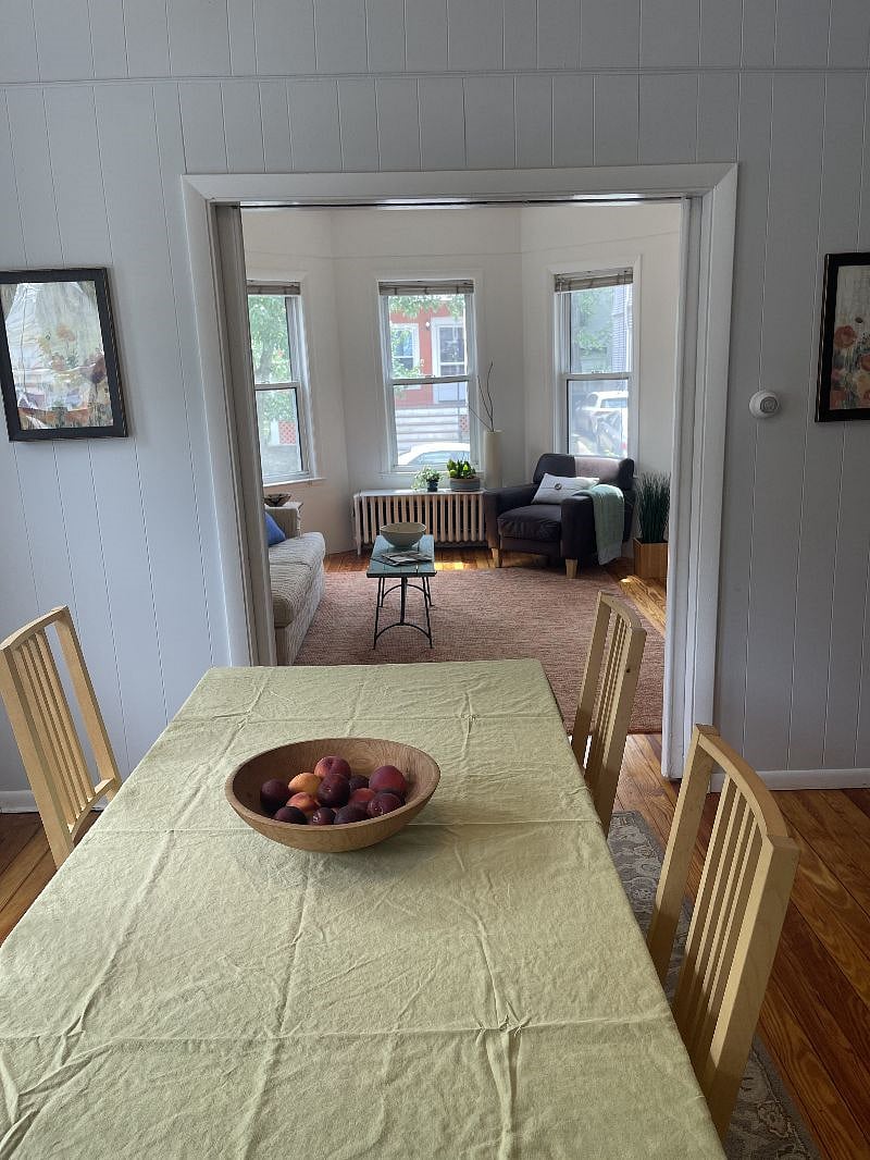 view from dining room to living room, sliding doors in case you want to cordon off these 2 rooms