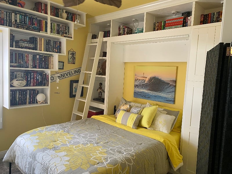 Library room, with queen bed. 