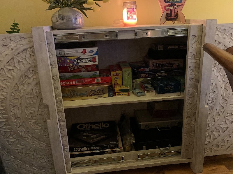 The board game cabinet. Cards, chips, and tons of games!