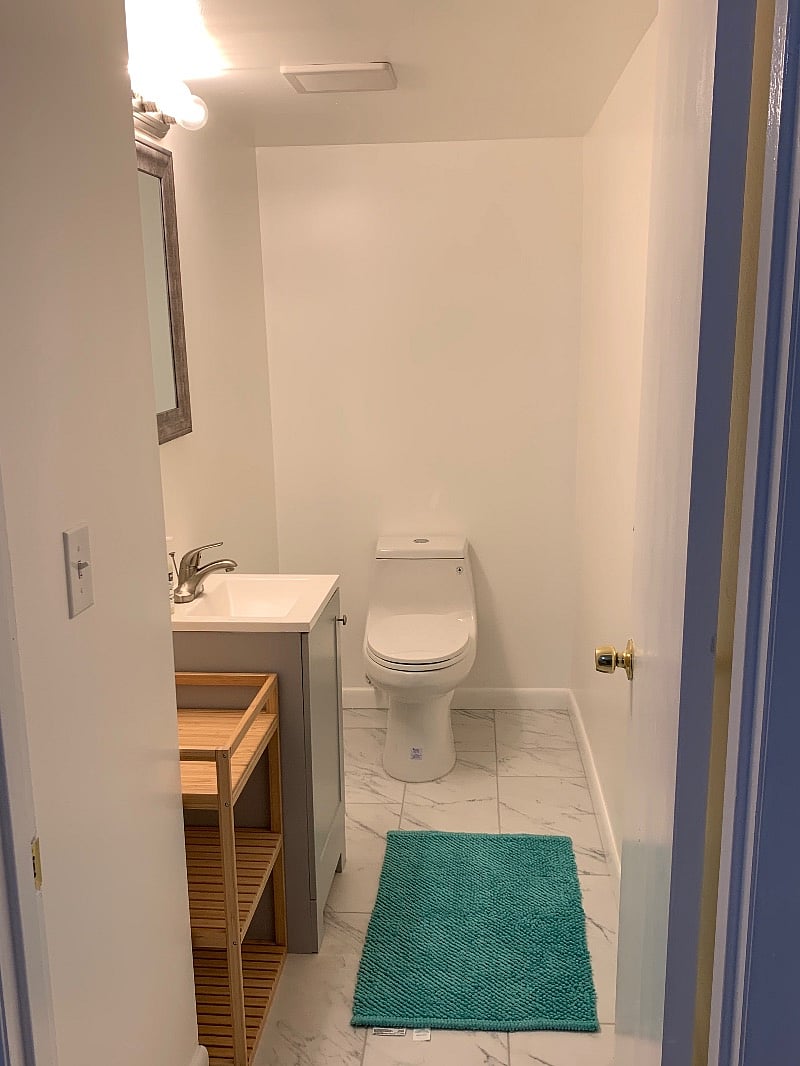 Downstairs 1/2 bathroom and 3rd bedroom 
