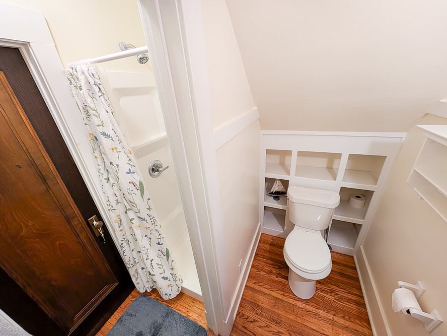 Bathroom #2
Newly renovated full bathroom with built-in storage and walk-in shower.