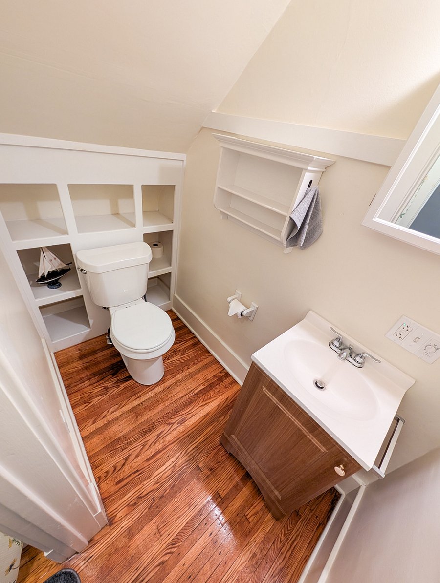 Bathroom #2
Newly renovated full bathroom with built-in storage and walk-in shower.