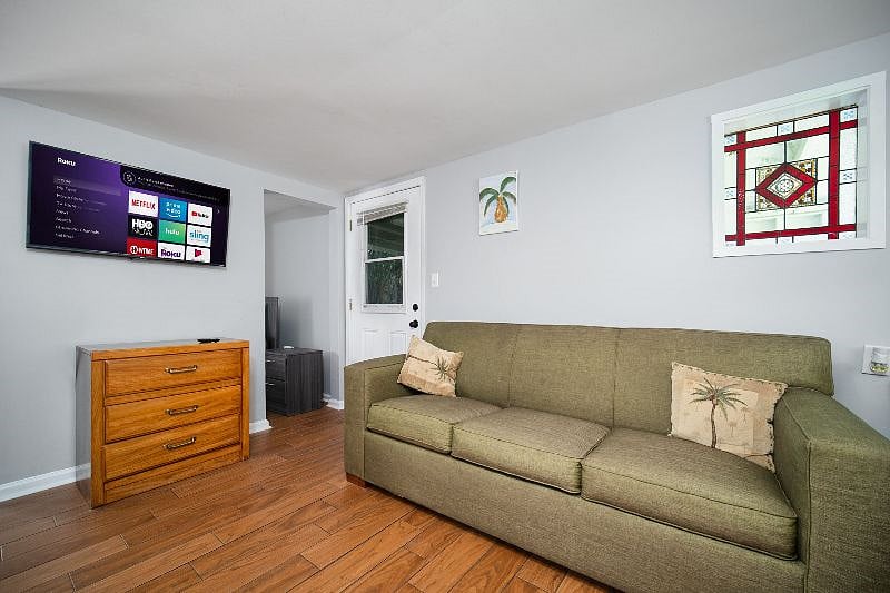 Living room with Roku TV and all apps and FREE high speed internet
