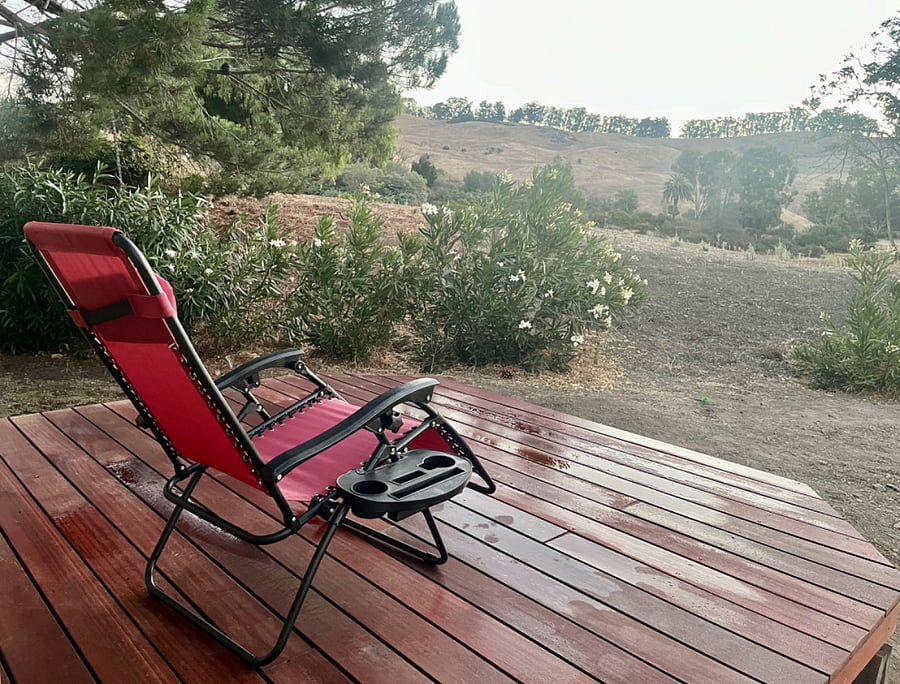 Private deck behind the cottage to relax on and enjoy the tranquility.