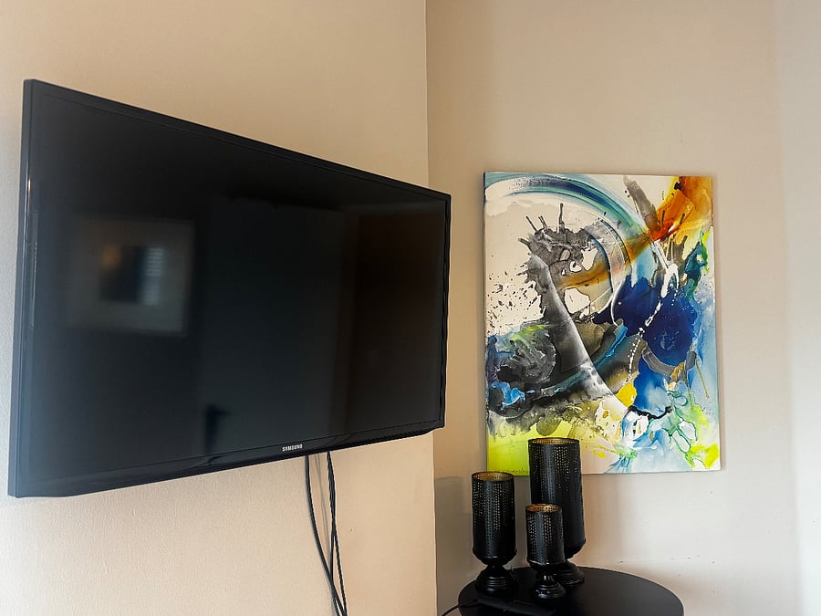 TV with streaming - primary bedroom