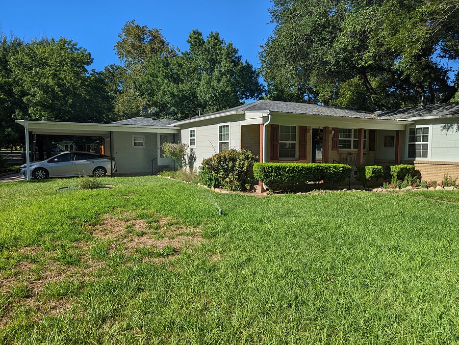 Front and side with carport  looking NE