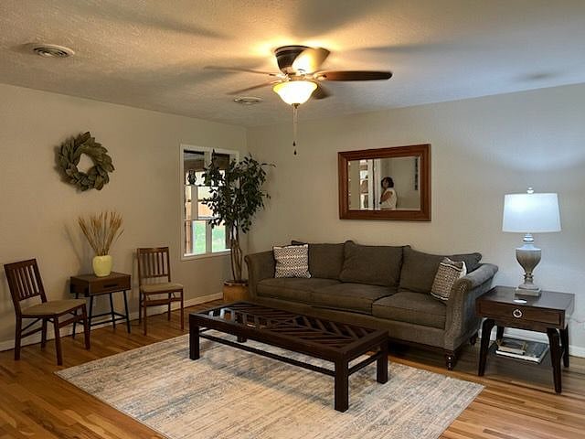 Living room - couch, coffee table, chairs