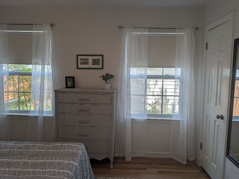 "Ansel Adams" bedroom queen bed & dresser with lots of windows and privacy.