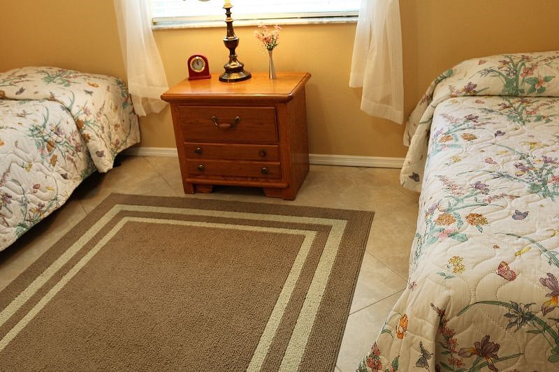 Bedroom three, two twin beds, no closet, large wardrobe in room.