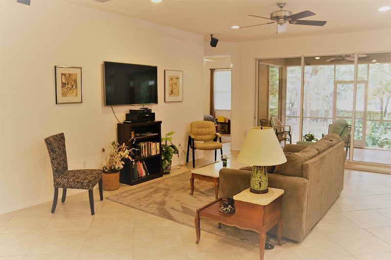 Wide open living area. 2 recliners plus sofa. The area with the pull out sofa is to the left of this area. Open floor plan.