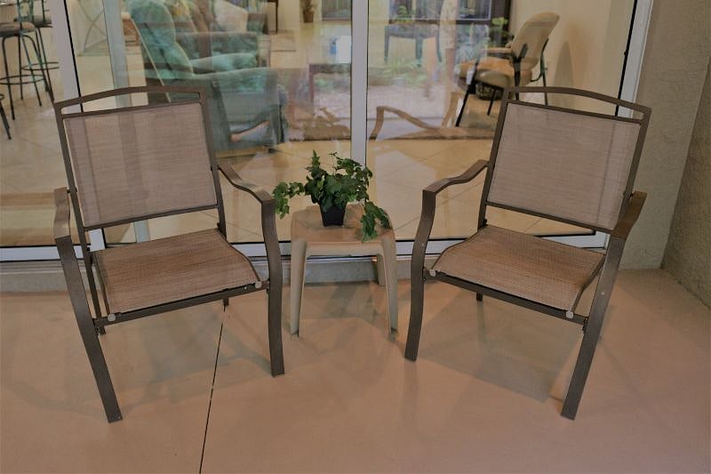 Screened patio chairs with small dining table (different than table pictured)