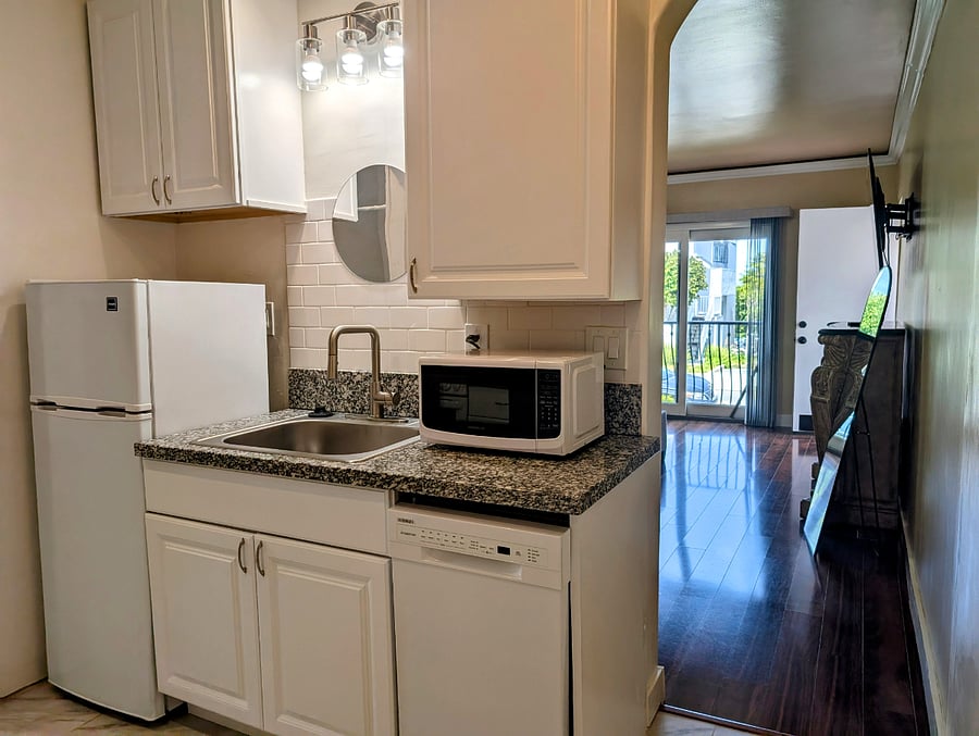 Kitchen is well appointed including dishwasher and garbage disposal.