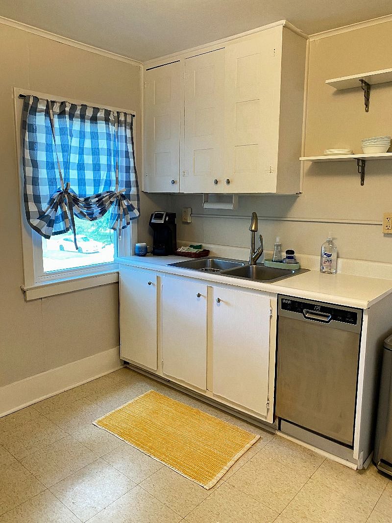 Kitchen counter and cabinets. The window is facing north.