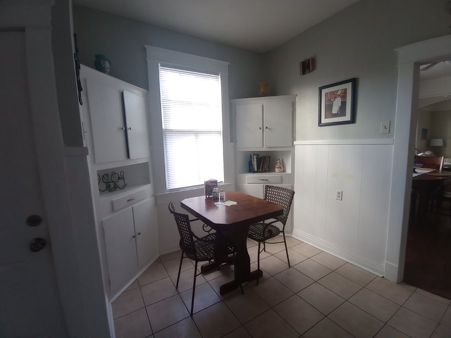 Enjoy a bit of Nostalgia with  original Built-In Corner Cabinets on opposite side of Kitchen  prep area. 