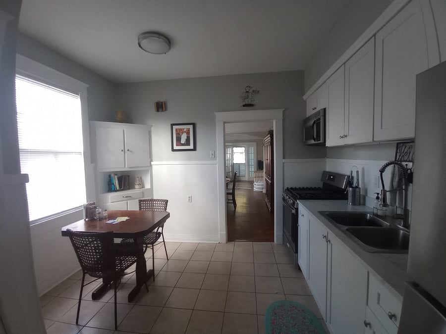 All new,  SS Gas Range with 4 Burners and a griddle, SS Fridge with ice maker, above the stove MW, new cabinets & new countertops. 