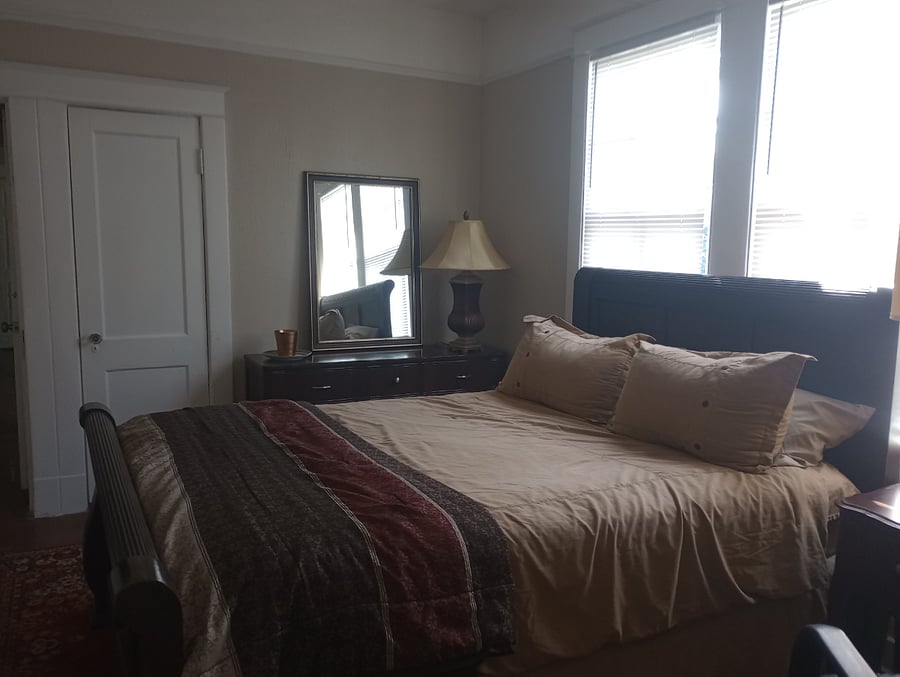 Bedroom 1, Queen Sleighbed, triple drawer dresser & makeup table.