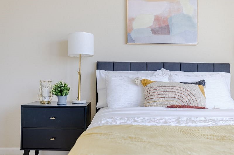 Main Level Bedroom 2 (Queen - sleeps 2) Crawl into hotel like microfiber sheets in this cool and quiet bedroom, Multiple pillow options, Easy access charger with multi ports for all of your devices. Luggage rack and closet with hangers. Multiple hooks for convenient storage.