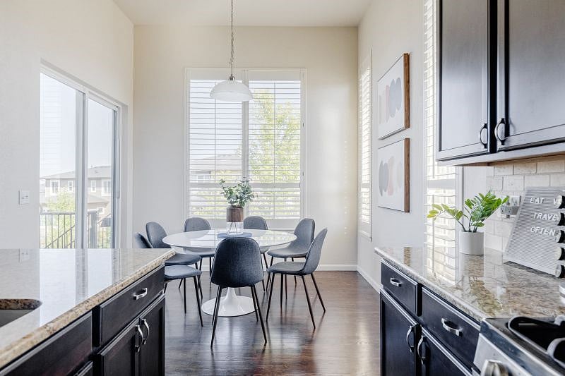 Kitchen Dining Table seats 7. Enjoy lots of natural light during breakfast or views of the deck and outdoors with dinner.