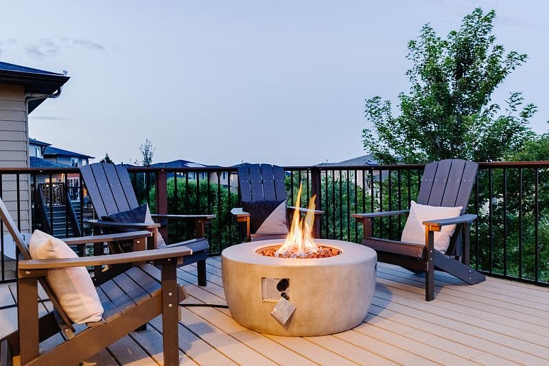 Enjoy the evening sunset and a beverage of choice. Adirondack chairs and a fire pit on demand with your own propane fire table and mood lighting around the large deck.