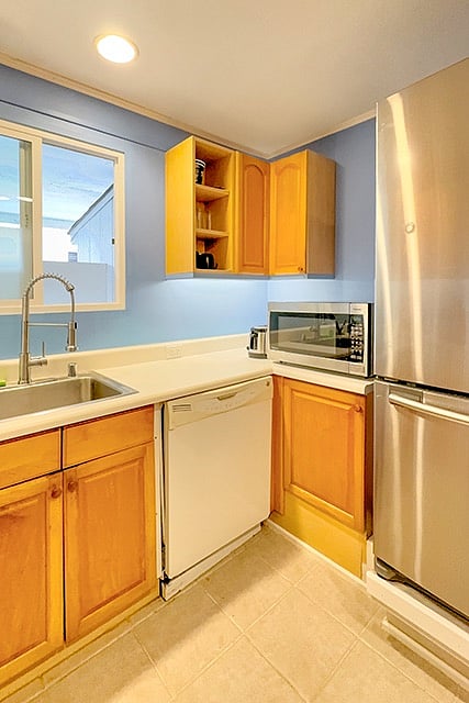 a large 2.2 cu/ft microwave compliments the stainless refrigerator.