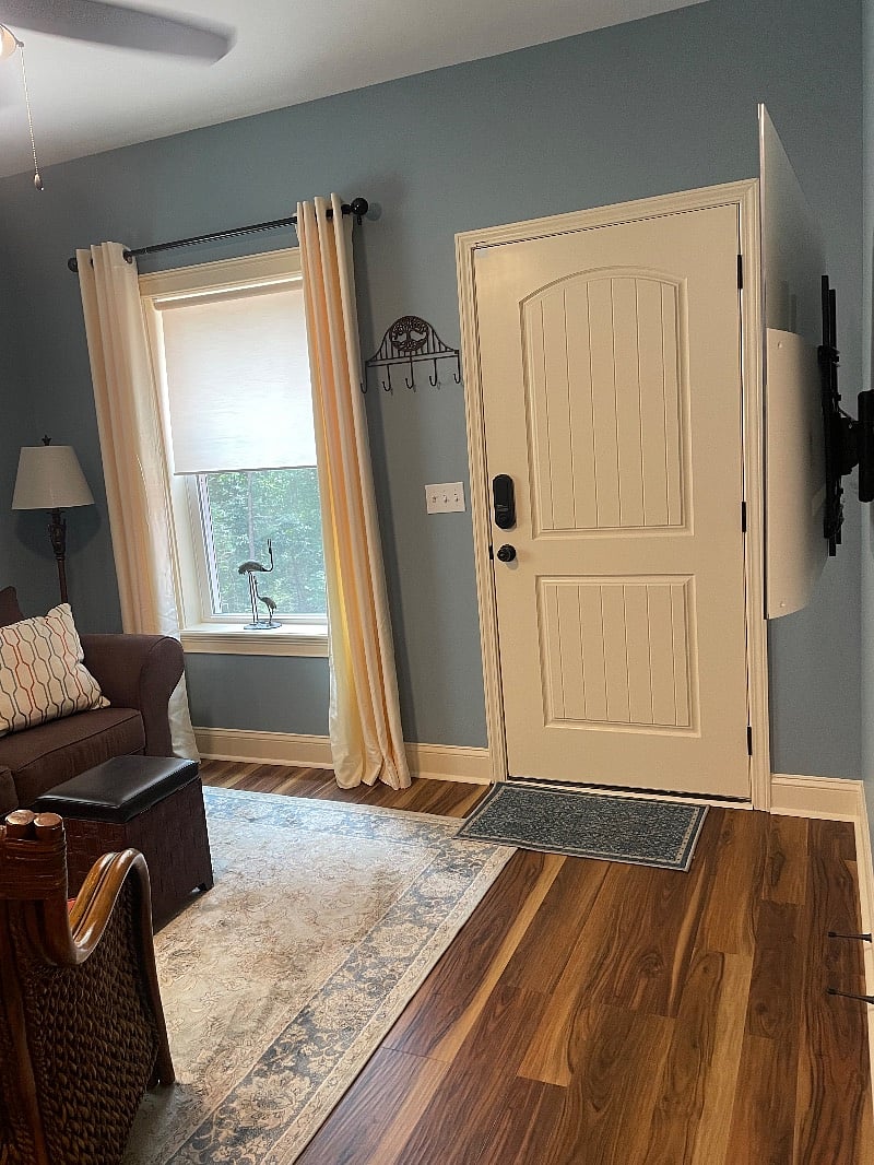 Private entry door. Two windows in the seating area.