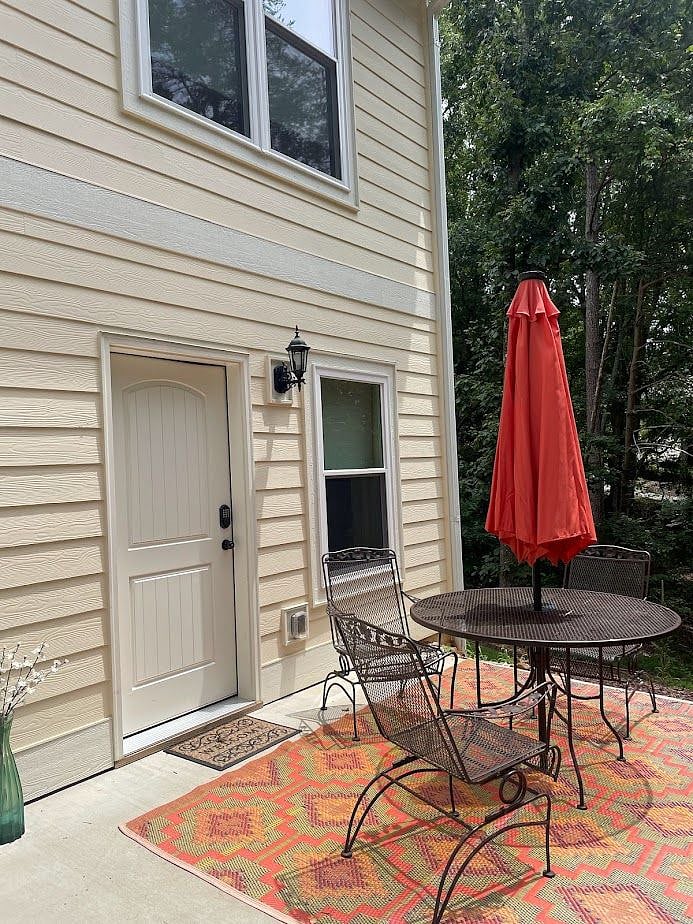 Patio with table and chairs.