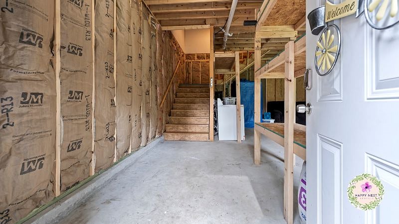 Main entrance through the garage.  The apartment is upstairs.