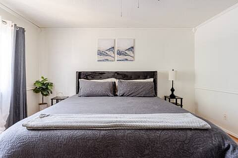 Primary room with blackout curtains.