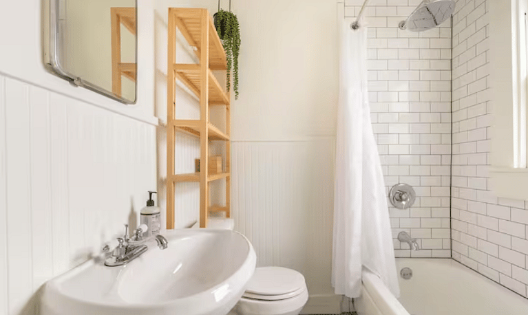 Full bath located in back bedroom.