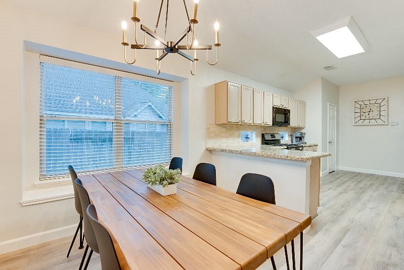 Enjoy a nice meal at the spacious table with seating for 6.