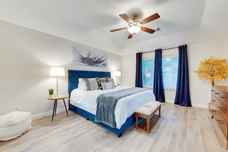 Ahhh... Welcome the master suite! Enjoy a large king size bed, plush bedding, and a ultra comfortable night's sleep. Sleep like a baby with all around black out shades.