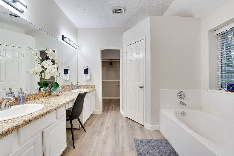 Large master bathroom. Dual sinks. Large garden tub and walk-in shower. Fresh clean and newly renovated.