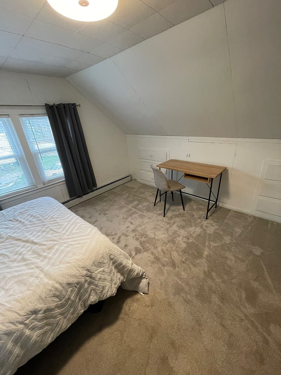 Bedroom #3 With table and chair. Built in drawers 
