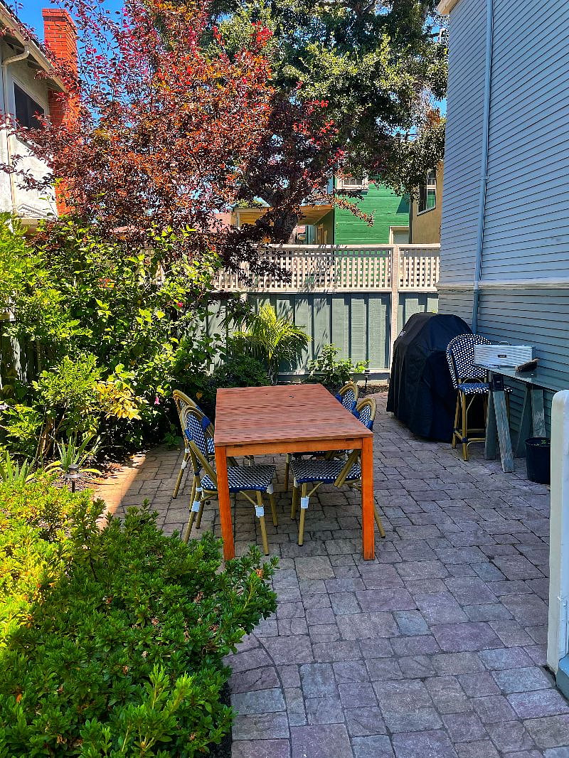 Shared outdoor dining space with Bar B Q