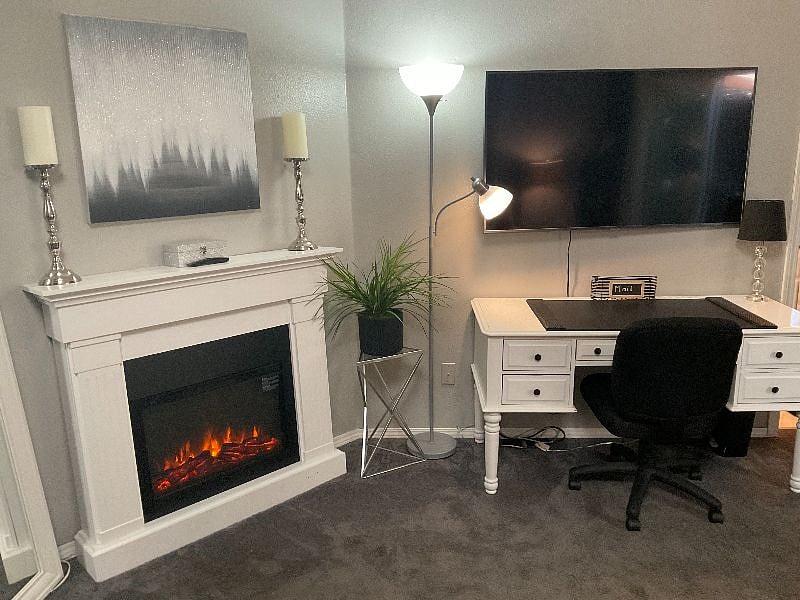 Primary Bedroom, fireplace, desk, large screen tv, Roku enabledSecond