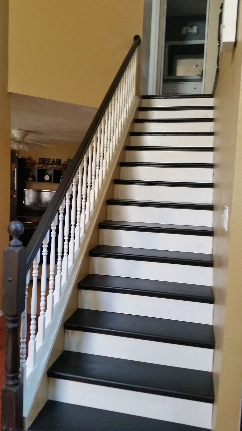 Stairs leading to 3 bedrooms