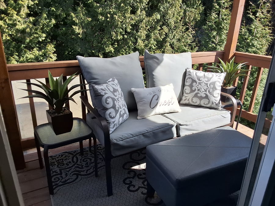 Primary bedroom private deck overlooking backyard