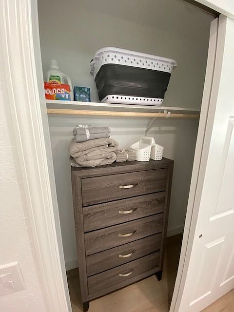 full closet includes dresser and laundry starter kit/basket