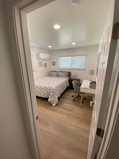 Unit C room from hallway- includes room AC/heater unit