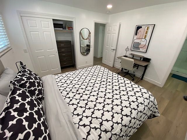 view of room from window side facing bedroom door