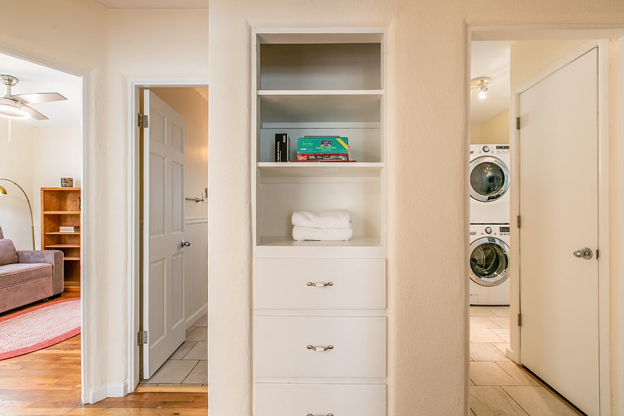 Hallways storage with games, extra towels and blankets.