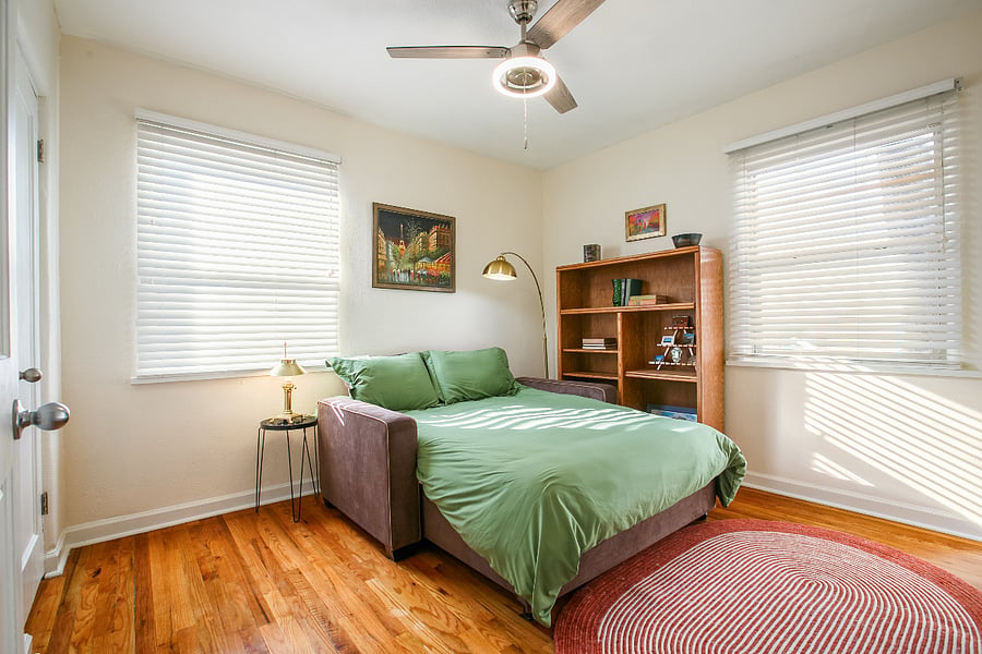 Bedroom 3 with couch pulled into full sized bed
