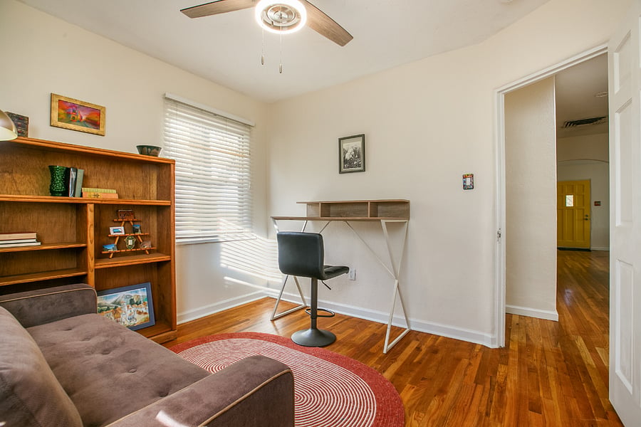 Bedroom 3 with couch pulled in and desk